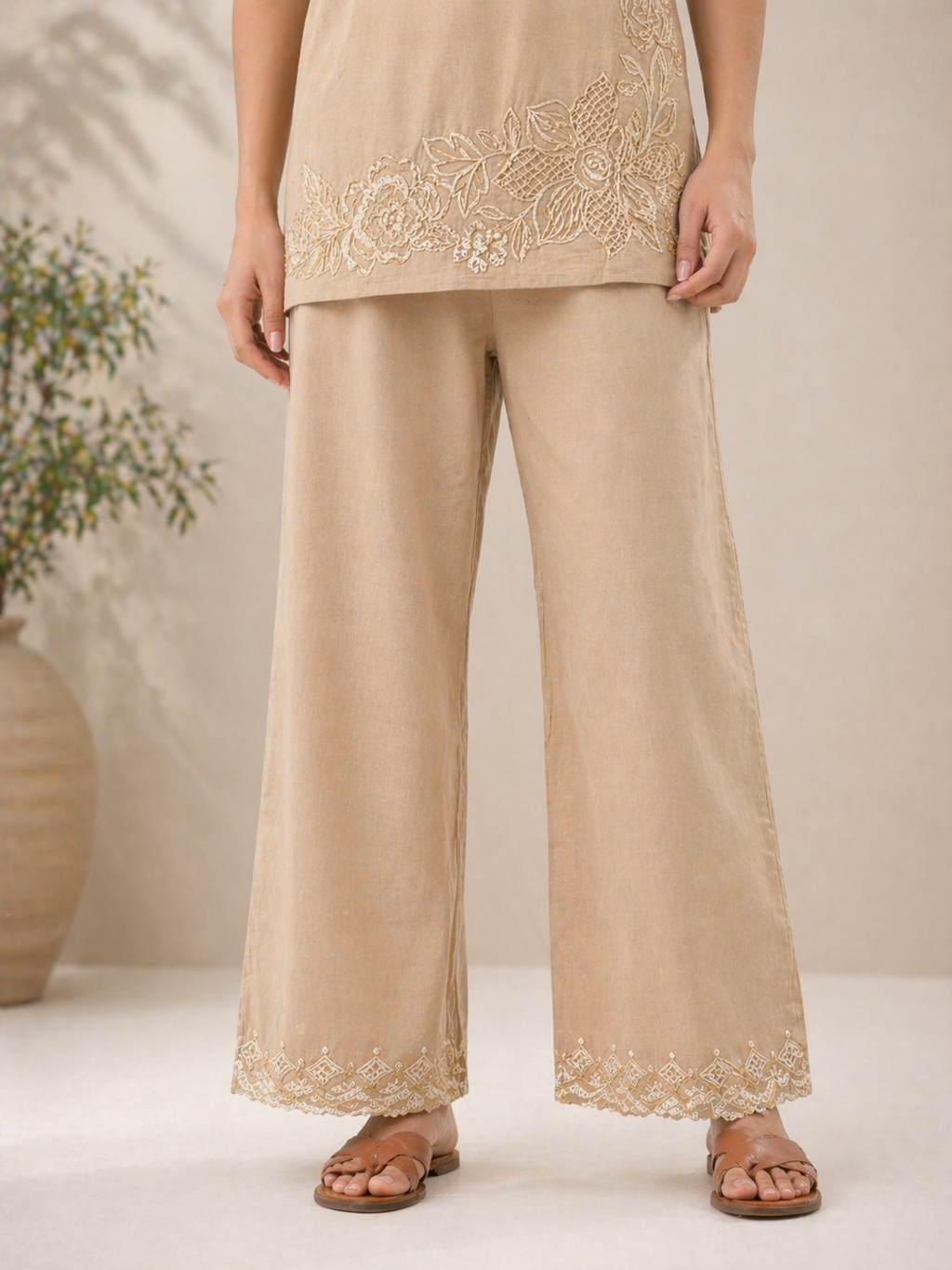 Beige straight pants with embroidered border detailing, part of ethnic kurta pant set for women